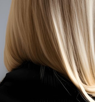 Langes blond gefärbtes Haar einer Frau - Detailansicht
