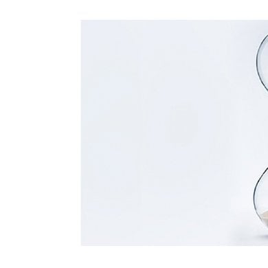 Eine Sanduhr, zur Hälfte abgelaufen