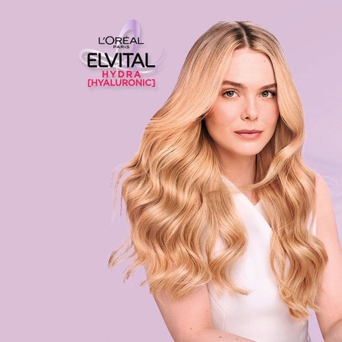 Elvital Hydra Hyaluronic Produktreihe und eine Frau