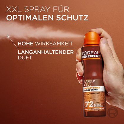 Eine Hand sprüht das Barber Club Deodorant mit sichtbarem Sprühnebel auf.