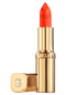 aufgedrehter Color Riche Satin Lippenstift in der Farbe Chez Lui geoeffneter Deckel liegt daneben