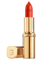 aufgedrehter Color Riche Satin Lippenstift in der Farbe Perfect Red geoeffneter Deckel liegt daneben