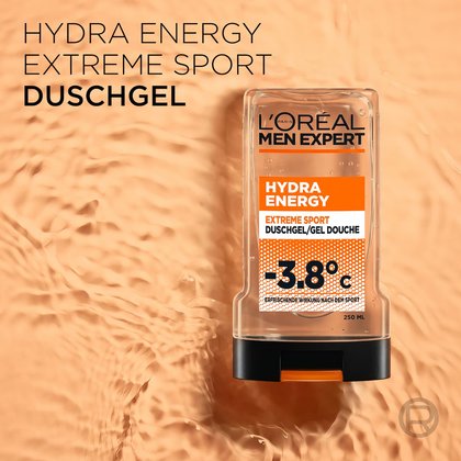 Hydra Energy Extreme Sport Duschgelflasche vor welligem Wasserhintergrund.