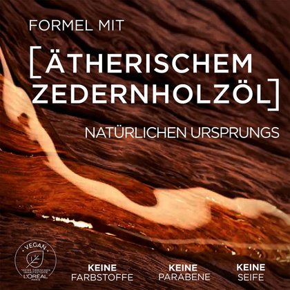 Nahaufnahme Holzstruktur darüber Text: Formel mit Ätherischem Zedernholzöl